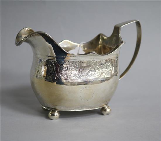 A George III Irish silver milk jug, marks rubbed, probably Dublin, 1811.